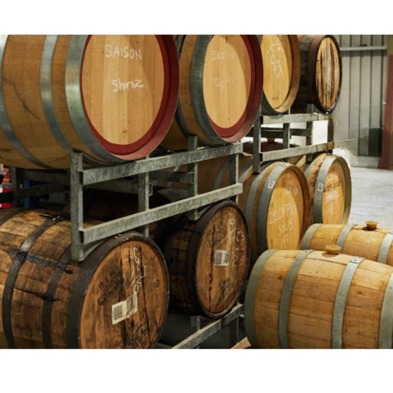 Five Eleven Distilling's barrels for whiskey and other aged spirits stacked up