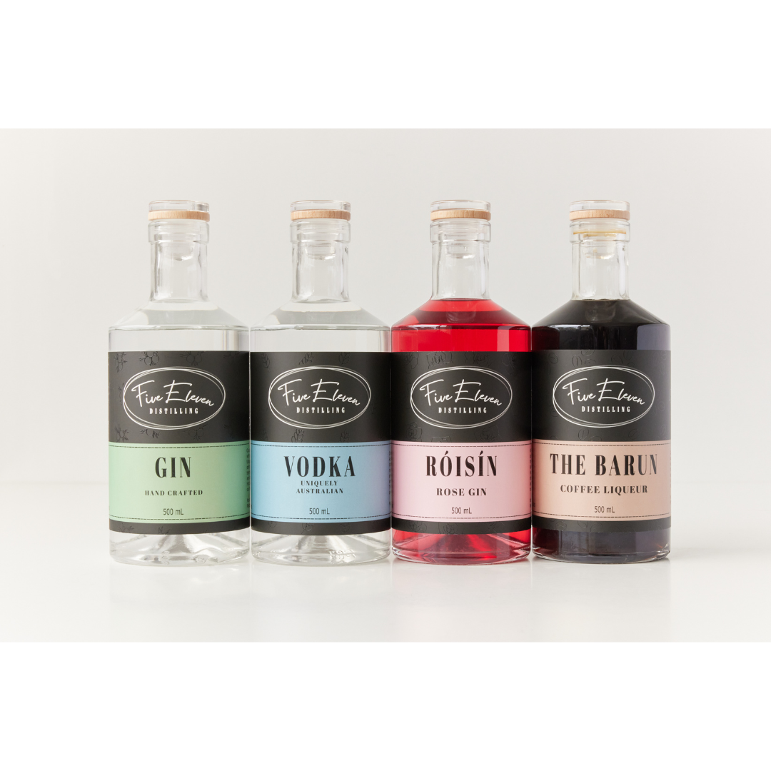 Four bottles of core range spirits. From left to right, gin, vodka rose gin and coffee liqueur