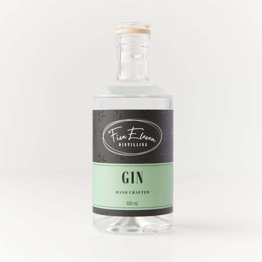 500 ml bottle of signature gin with a glass closure and floating wood disc